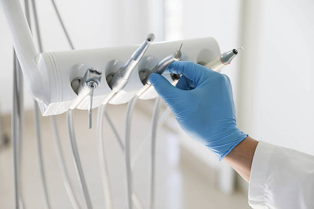 Professional Tooth Extraction technician working in Healdton, OK